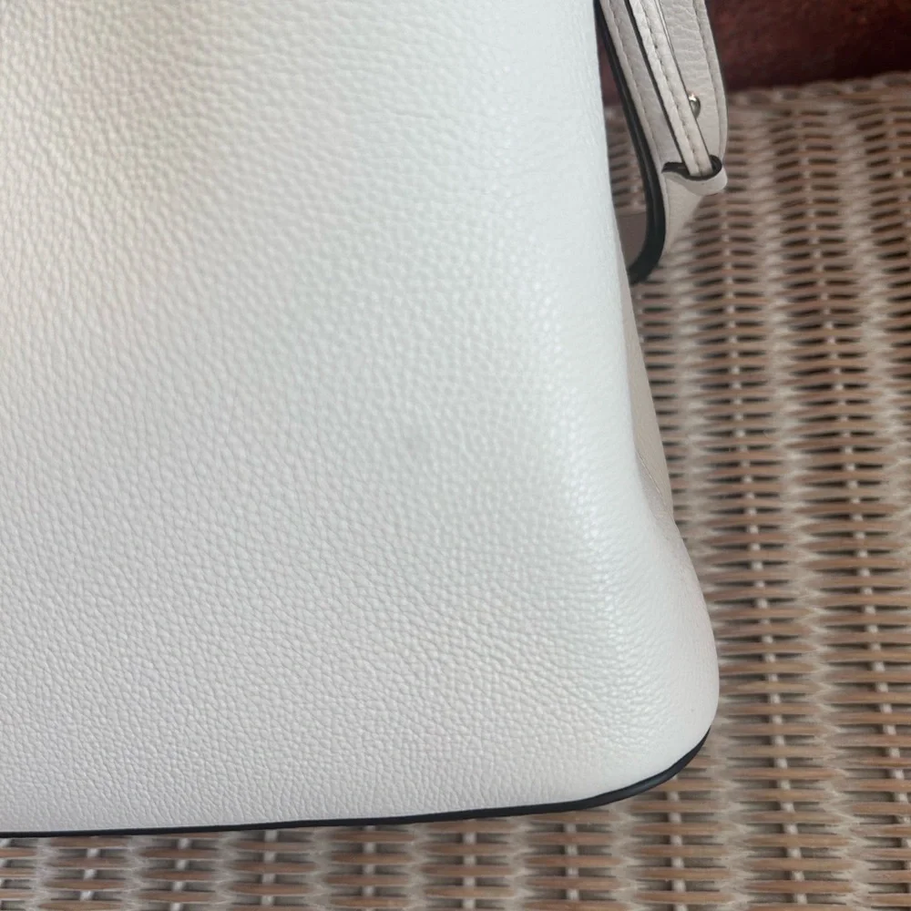 Kate Spade New York Marti large bucket bag in white pebbled leather.